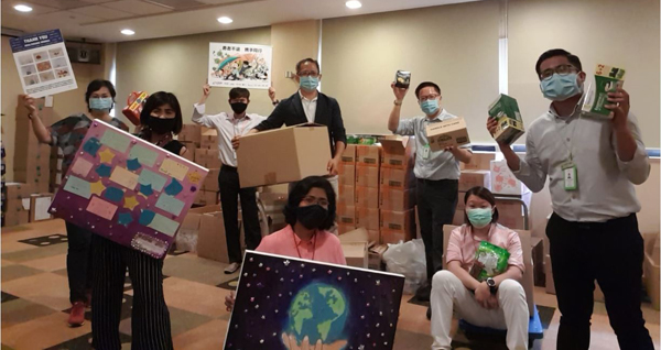  ​The extended welfare team in the “store room” at Work-Life Unit where some gifts were temporarily parked.