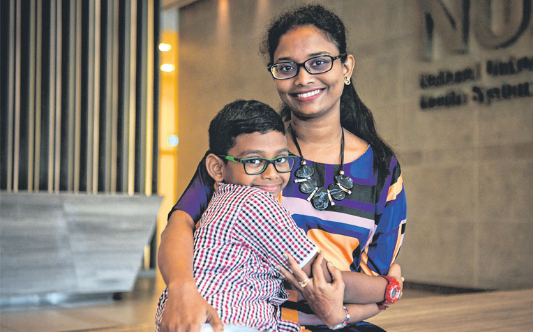 Madam Mislia Supar, 42, are both part of the Growing Up in Singapore Towards Healthy Outcomes study.