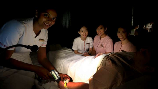  ​​National Heart Centre Singapore nurses (from left) Abirami Nagarasan,34, Xiao Bing, 26, Siti Fidawati Jasman and Wu Wing Yin were part of a team that brainstormed for a solution to avoid disrupting other sleeping patients while they attended to one during their nightly rounds.  ST PHOTO LAU FOOK KONG 